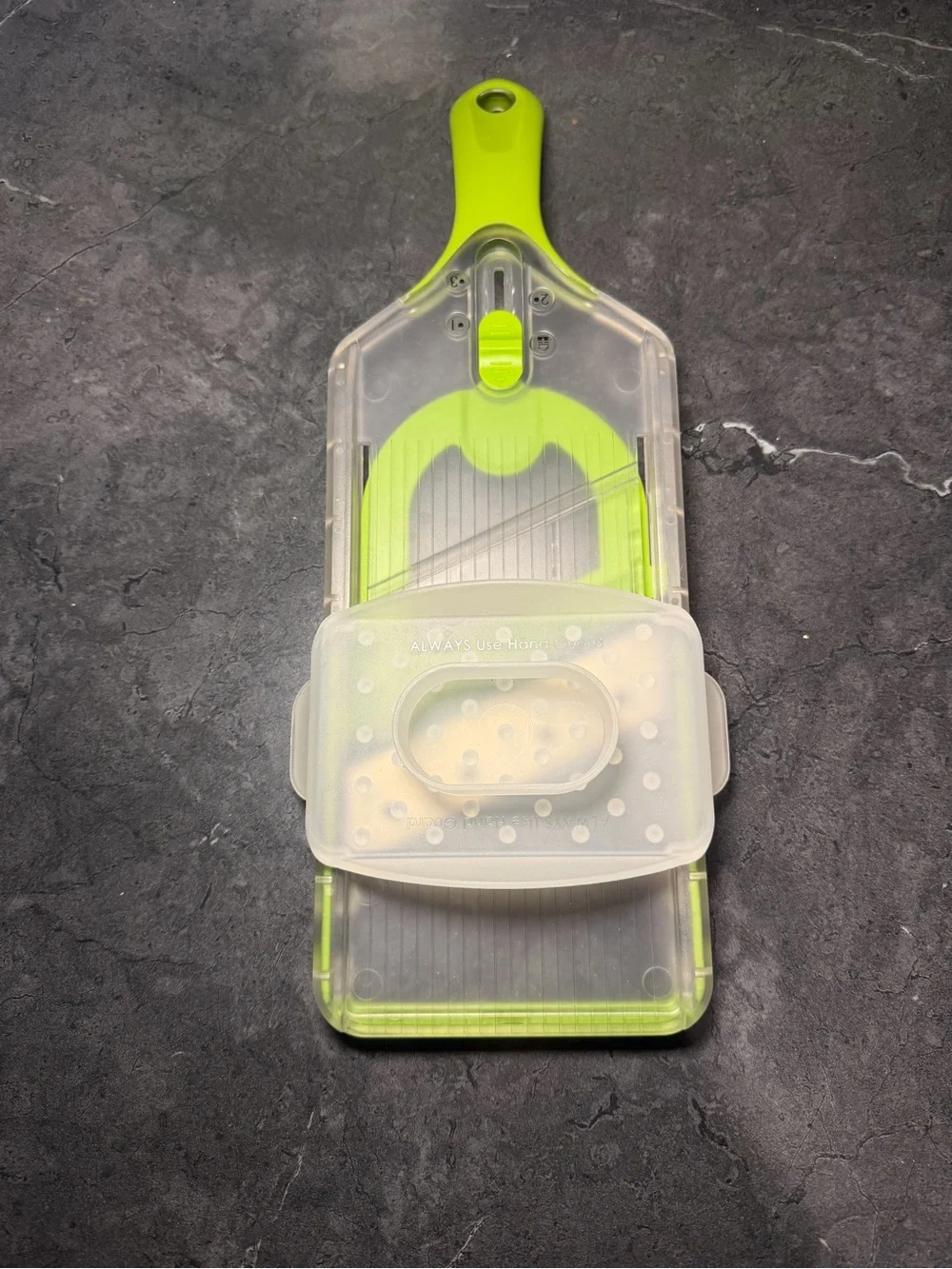 Hand-held mandoline slicer Fruits  Vegies, green V-shaped stainless steel blade
